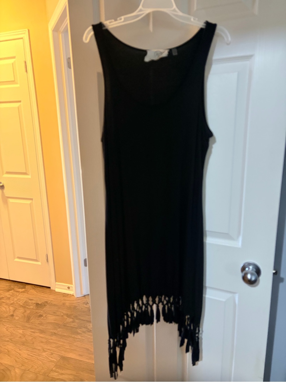 Black Fringe scoop neck Sleeveless Dress with bohemian handkerchief hem. - Picture 2 of 3